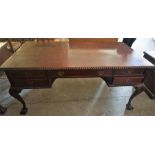 A Chippendale Style Partners Desk, with five drawers to each side, raised on ball and claw feet,