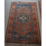 A Persian Saveh Hand Knotted Rug, Decorated with a large geometric medallion to the centre,