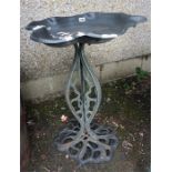 A Reproduction Garden Stand, raised on a cast iron base, 74cm high, 57cm wide