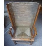 A Pine Framed Orkney Armchair, circa late 19th/ early 20th century, with woven rush back and seat,