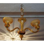 A Venetian Style Amber Glass Ceiling Light, with three candy cane style branches, 61cm high