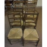 Six Rush Seated Chairs, comprising of a pair of Lancashire style carver armchairs, 109cm high, and a