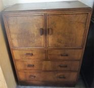 A Vintage Walnut Cupboard Chest, with two doors above two small drawers and two long drawers,