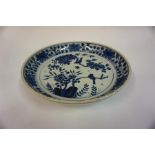 A Chinese Blue & White Dish, in the 18th century style, of circular form, decorated with panels of