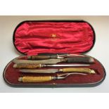 A Five Piece Silver Ferruled Carving Set, Hallmarks for Goldsmiths & Silversmiths Company, 112
