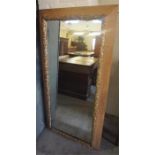 A Large Giltwood Framed Wall Mirror, of rectangular form, 144cm high, 70cm wide