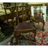 A Set of Six Chippendale Style Mahogany Dining Chairs, To include two carver chairs, With a purple