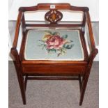 An Edwardian Mahogany Inlaid Piano Stool, With a hinged needlepoint seat, 69cm high