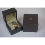 A GC Swiss Made Quartz Chronograph Gents Wristwatch, circa 2012, with a gold plated bezel, the