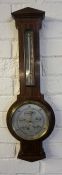 A Mahogany & Line Inlaid Barometer By Redfern,s Sheffield, with a silvered thermometer guage and