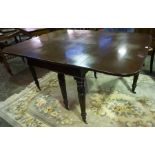 A Late Victorian Mahogany Drop Leaf Table, Adapted from a larger table, raised on six reeded