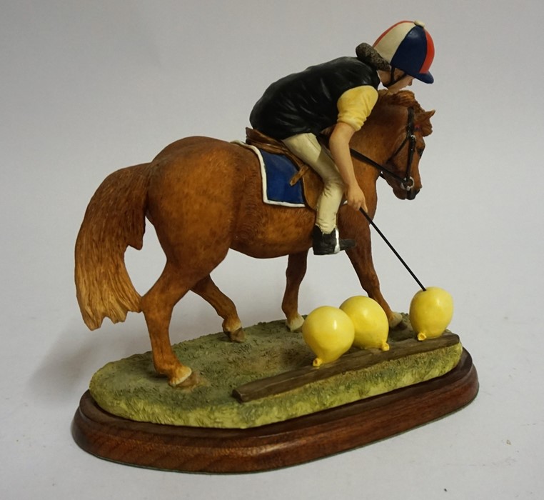 A Border Fine Arts Figure Group "The Balloon Race" From the Hay Days range, 15cm high