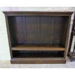 An Edwardian Oak Open Bookcase, with three shelves, lacking shelve hooks, 120cm high, 137cm wide,