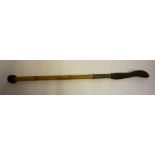 A Riding Crop/Cosh by Swaine & Adeney, circa early 20th century, with a coin style mount to the