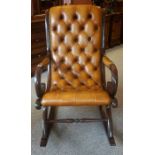 A Victorian Style Mahogany Rocking Chair, Upholstered in tan button back leather, 66cm high