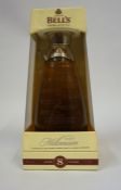 Bells 8 Years Old "Millennium 2000" Blended Scotch Whisky, in a glass decanter, 40% vol, 70cl,