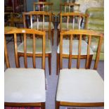 A Set of Ten 1970s Retro Dining Chairs by McIntosh, Including two carver chairs, with rail back