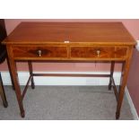 A Sheraton Revival Writing Table, With two small drawers, raised on tapered legs with adjoining