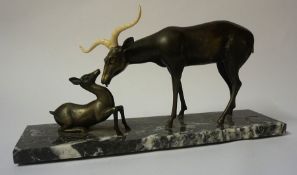 A Cast Bronze Deer & Fawn Figure Group, raised on a mottled marble plinth base, 22cm high, 45cm
