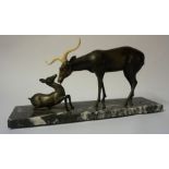 A Cast Bronze Deer & Fawn Figure Group, raised on a mottled marble plinth base, 22cm high, 45cm