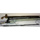 A Three Piece "Black Fly" Fishing Rod by Shakespeare, 1602-300, with carry bag, also with a