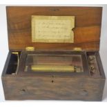 A Victorian Rosewood Cased Music Box, With change/repeat and stop/start levers, 11cm high, 34cm