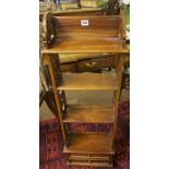 An Indonesian Hardwood Open Bookcase, With fretwork sides, and open shelving above two drawers,