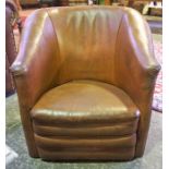 A Tan Leather Tub Armchair, 66cm high