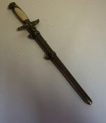 A Reproduction SS Dagger, blade 25cm long, in a metal scabbard