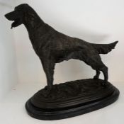 A Cast Bronze Figure of an Irish Setter, engraved "Mene" to stand, raised on an oval base, 30cm