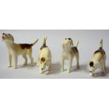 Four Beswick Porcelain Figures of Fox Hounds, Comprising of two pairs of figures, 7cm high, (4)