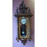 A Walnut Cased Vienna Wall Clock, circa early 20th century, with a horse and figure surmount to