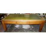 A Large Edwardian Oak Partners Library Table, With three small drawers and two larger drawers to the