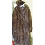 A Vintage Ladies Musquash Fur Coat, With label for Patrick Thomson Edinburgh, 106cm long, also