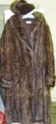 A Vintage Ladies Musquash Fur Coat, With label for Patrick Thomson Edinburgh, 106cm long, also