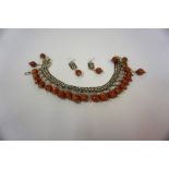 An Indian Style Silver Necklace with Matching Earrings, the necklace is decorated with agate style