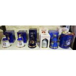 Eight Bells Commemorative Whisky Decanters with Contents by Wade, with boxes and outer tins, (8)