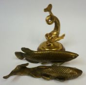 Three Assorted Brass & Gilt Metal Fish Ornaments, one example raised on a wood stand, 24cm high, 28,