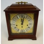 A Mantel Clock by J.W. Benson, with a German movement, the silvered dial with Roman and Arabic
