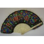 A Canton Fan, Qing Dynasty, circa late 19th century, with Mandarin style double sided paper,