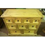 A Modern Stripped Wood Apothecary Style Chest of Drawers, With nine graduated drawers, 83cm high,