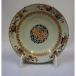 A Chinese Pottery Circular Charger, circa 18th century, Decorated with imari coloured floral
