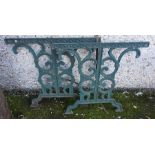 A Pair of Antique Green Painted Cast Iron Garden Bench Ends, 66cm high, 68cm wide, (2)