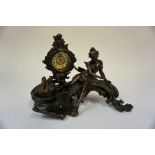 A French Patinated Bronze Figural Mantel Clock, circa early 20th century, with integral inkwell,