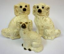 A Pair of Staffordshire Pottery Wally Dugs, with amber glass eyes, drilled to reverse, 25cm high,