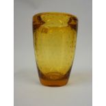 A Whitefriars Amber Coloured Glass Vase Designed by William Wilson, with gold coloured inclusions,