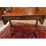 A Good Quality Reproduction Mahogany Sofa Table, with two drawers and opposing dummy drawers, with a