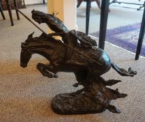 After Frederic Remington (1861-1909), A Large Bronze Figure Group of a Native American on Horseback,