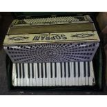 A Soprani "Three" Piano Accordion, Decorated in faux mother of pearl, with carry case