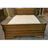 A Willis & Gambier Louis Phillipe style Cherry Wood King Size Sleigh Bed, with side rails and wooden